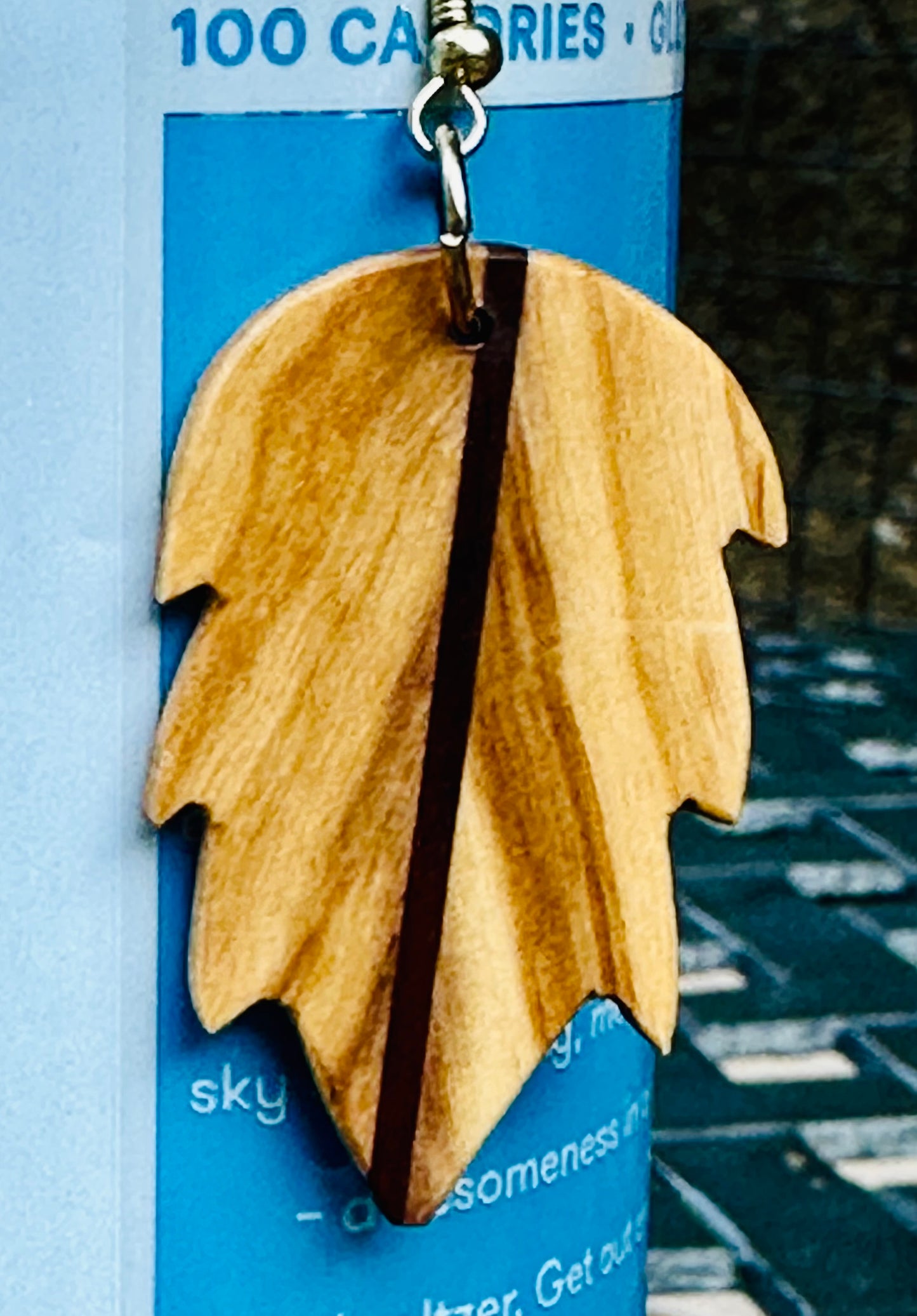 1E. Custom earrings. Bookmatched Leaf and Arrow feathers.