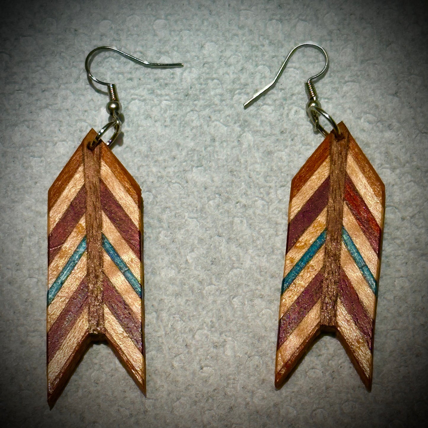 1E. Custom earrings. Bookmatched Leaf and Arrow feathers.