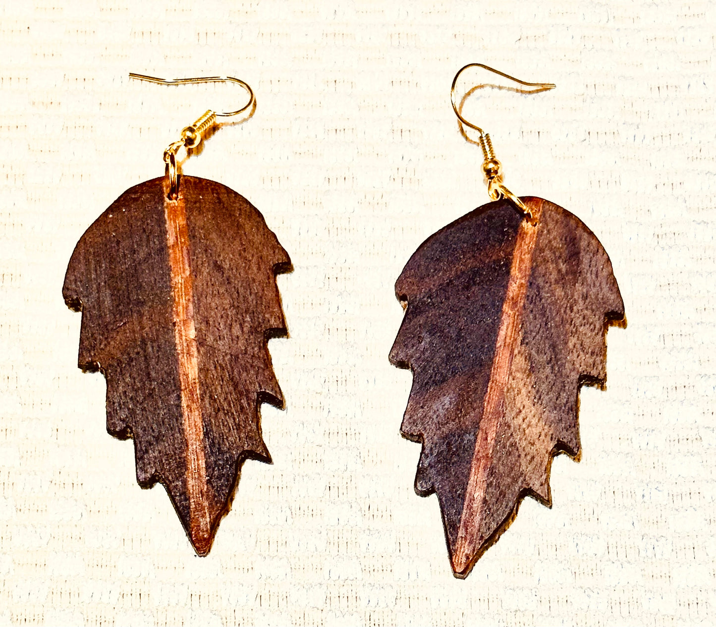 1E.  Custom earrings. Bookmatched Leaf and Arrow feathers.