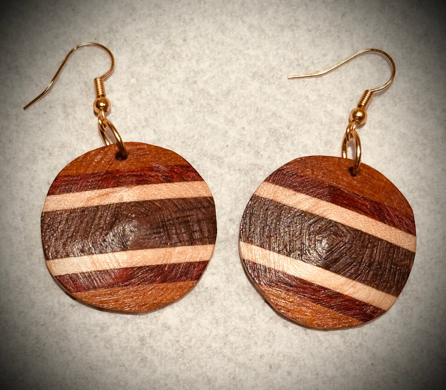 1D.  Custom Earrings.   Inlaid geometric stripes.