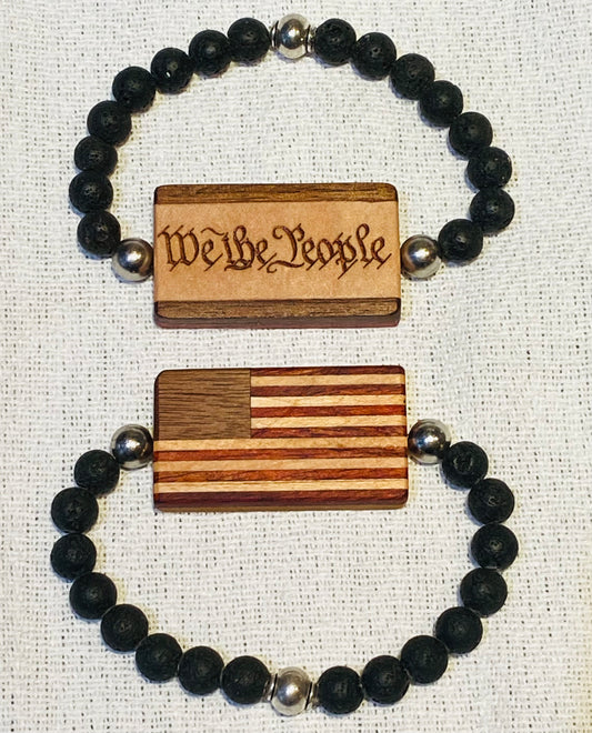 9.   Bracelet.  American Flag Bracelet with “We the People” on reverse.